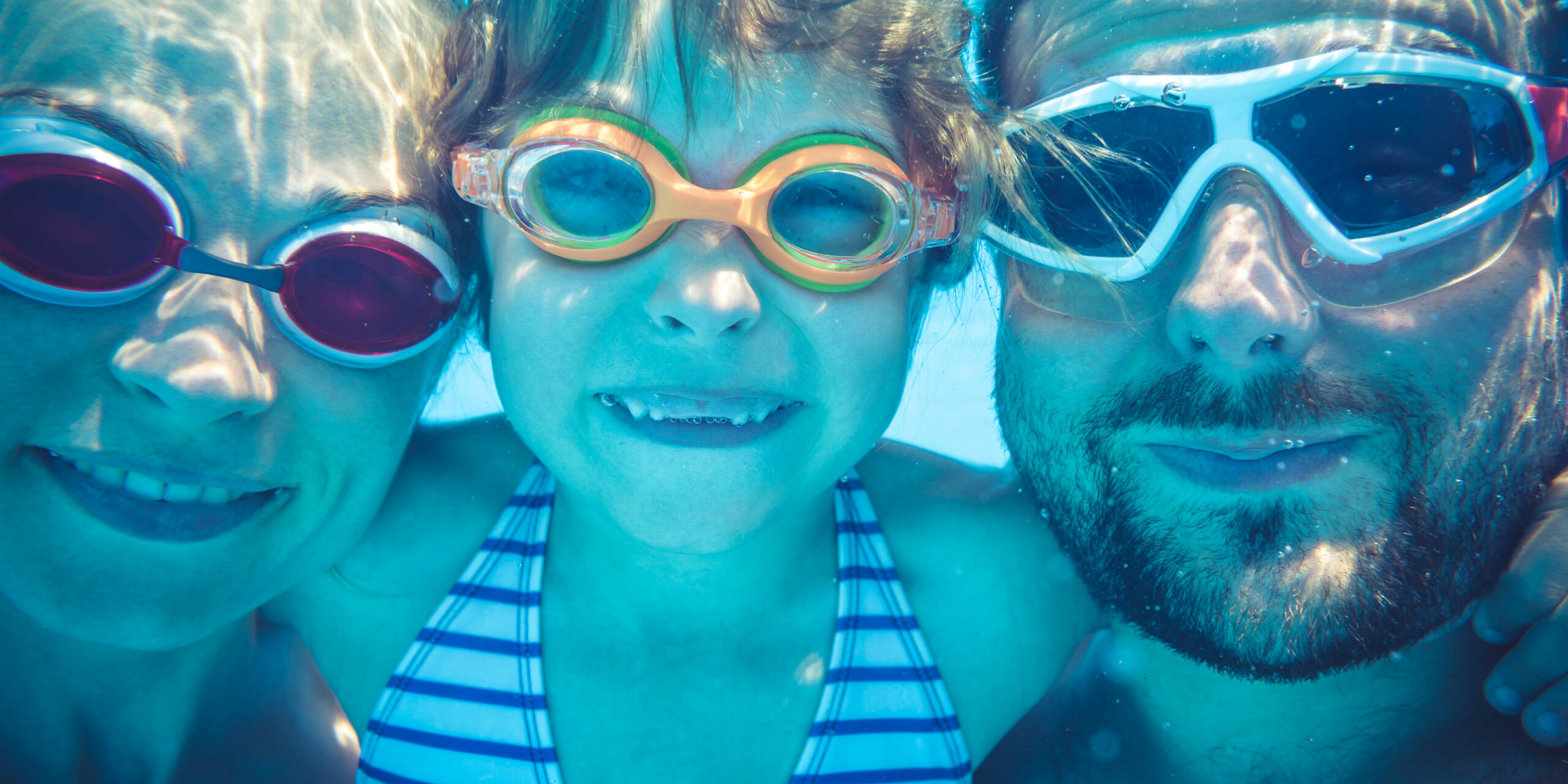 Underwater portrait of family